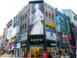 Traditional outdoor advertising in city streets – billboards on buildings